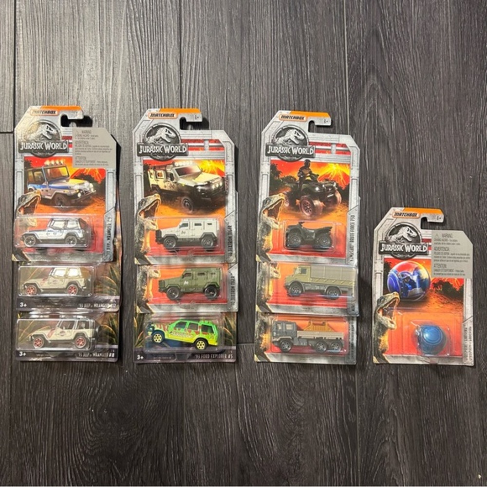 Matchbox Jurassic World vehicles and Gyrosphere new in package shelf wear